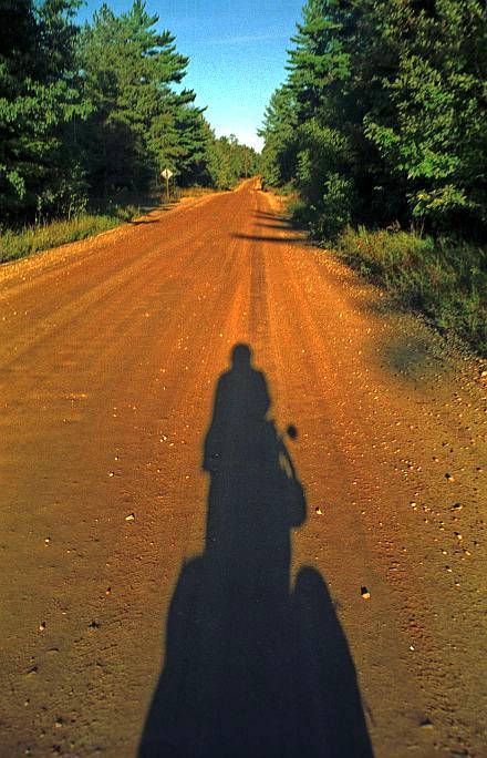 sunset travel to campsite on H-58 just east of the Luce county line, 2007 ride view, H-58 east unpaved 2007
